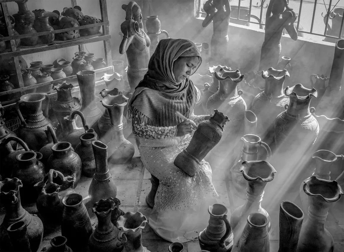 Pottery village girl by Van Dong Nguyen Portrait Category Winner in the Black and White Photo Awards 2024