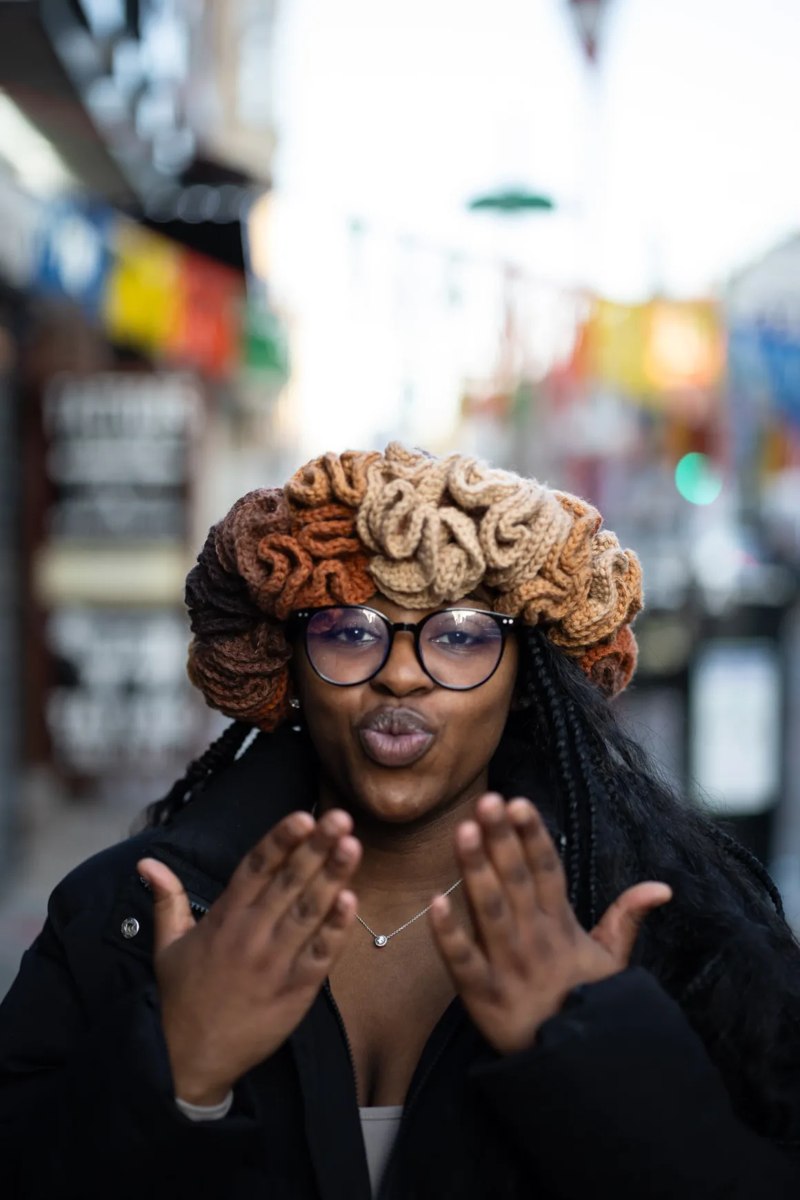 Portrait by South Street Sam woman blowing kiss