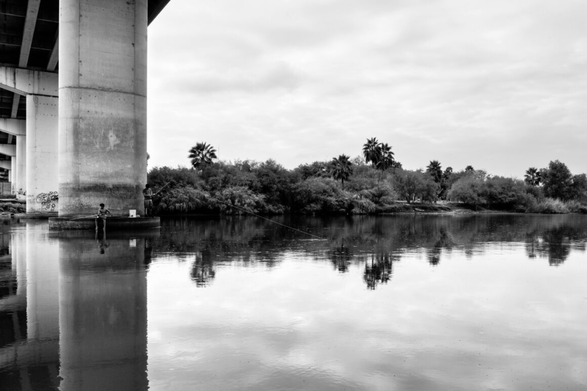 Two Mexican Fisher Boys. Rio Grande River Mexico United States border Texas